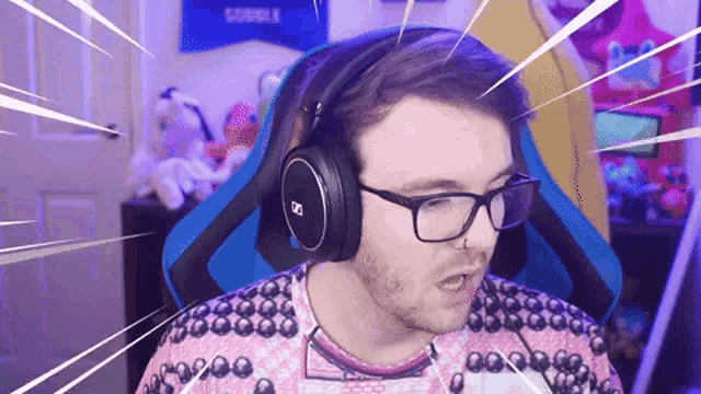 a man wearing glasses and headphones with the letter d on it