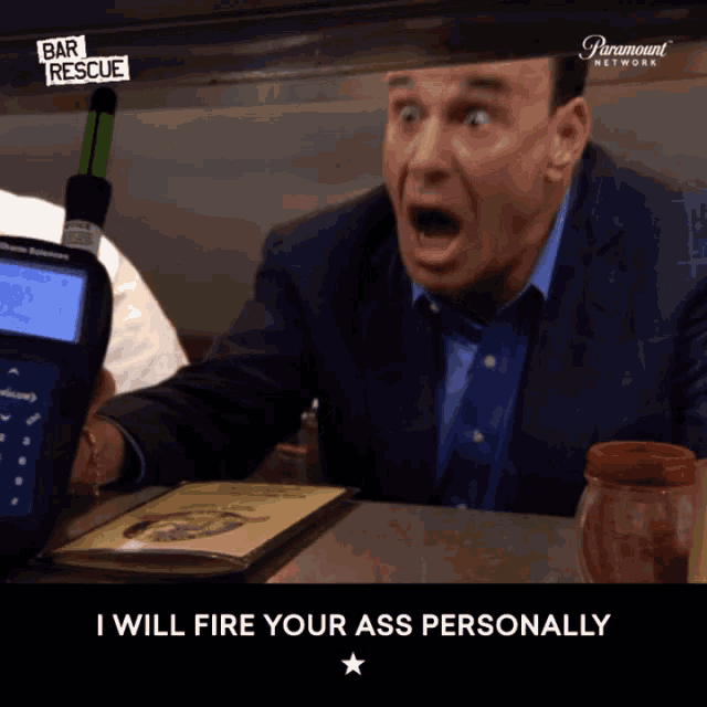 a man in a suit says i will fire your ass personally in a paramount network ad