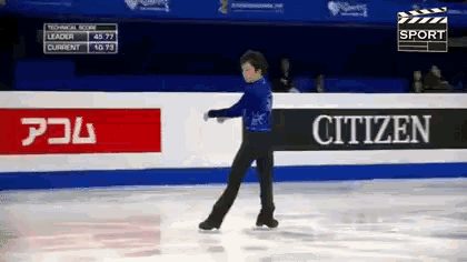 a man is ice skating in front of a sign that says citizen on it
