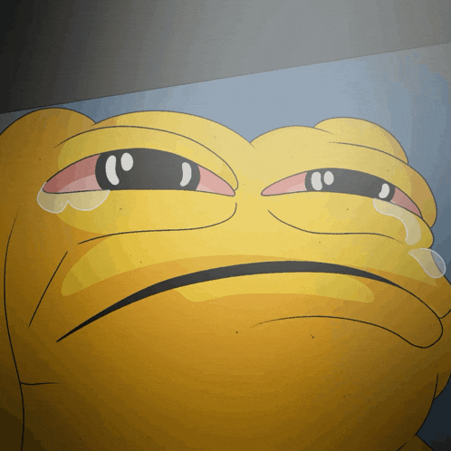 a yellow frog is crying with a tear coming out of his eyes