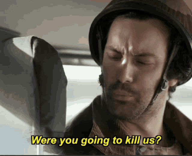 a man wearing a helmet is asking if he is going to kill us
