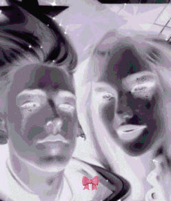a black and white photo of a man and woman