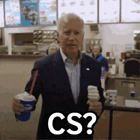 a man in a suit is holding an ice cream cone and the word cs is on the bottom