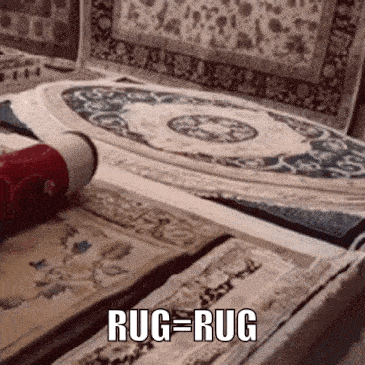 a bunch of rugs are stacked on top of each other and the word rug is visible