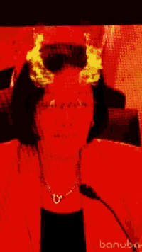 a woman with horns on her head is wearing a red jacket