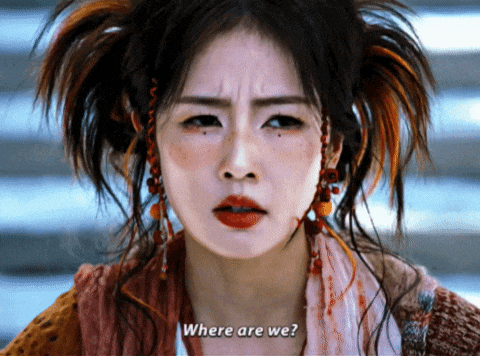 a woman is asking where are we in a close up