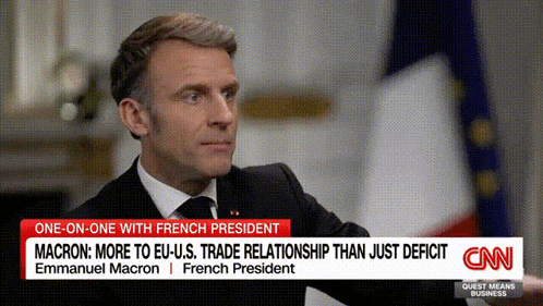 cnn shows a man in a suit and tie on the screen