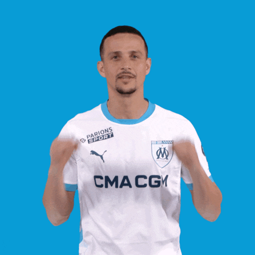 a man wearing a white shirt with cma cgm written on it