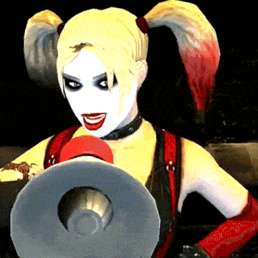 a harley quinn holding a megaphone in her hand