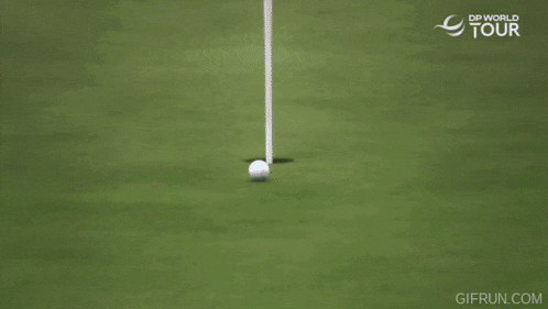 a man is holding a golf club over his head with a gif run.com logo in the background