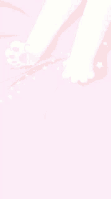 a close up of a person 's paws on a pink background .