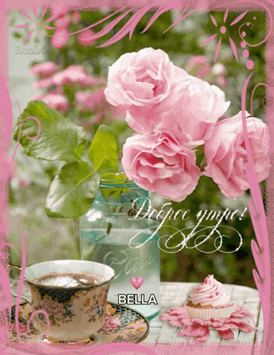 a cup of coffee sits on a saucer next to pink roses and a cupcake