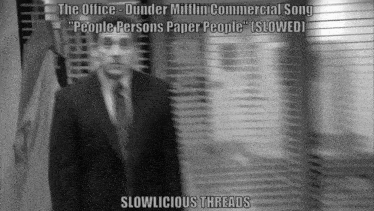 a black and white photo of a man in a suit and tie with the words " slowlicious threads " on the bottom