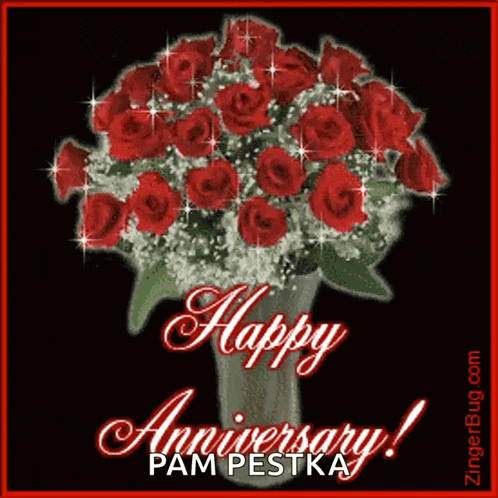 a bouquet of red roses in a vase with the words happy anniversary