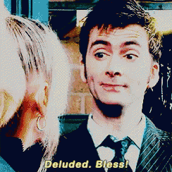 a man in a suit and tie is talking to a woman and says deluded bless