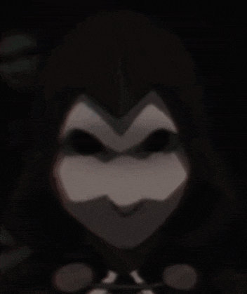 a close up of a person 's face with a mask on it in the dark .