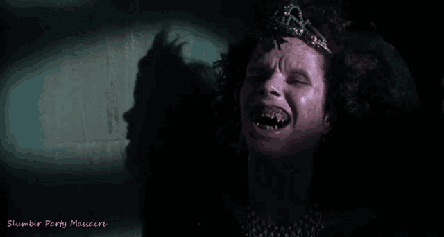 a woman with a tiara on her head is crying with the words stumble party massacre below her