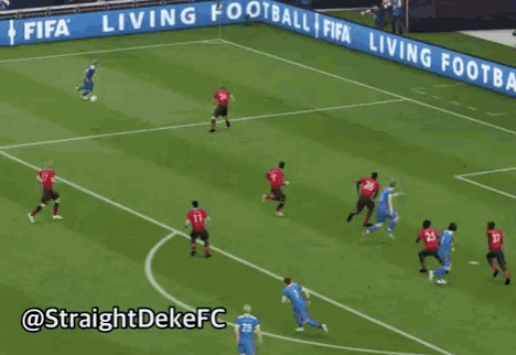 a soccer game is being played on a soccer field with a banner that says living football