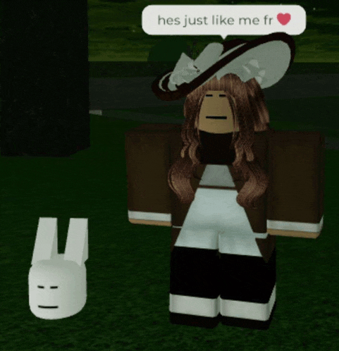 a girl in a hat stands next to a white rabbit and says hes just like me fr