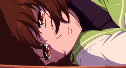 a girl with brown hair and red eyes is laying on the floor