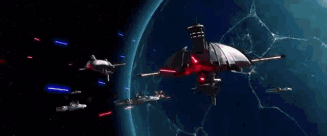 a group of spaceships are flying around a planet in space and shooting lasers at it .