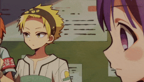 a boy wearing a shirt that says lemon is standing next to a girl