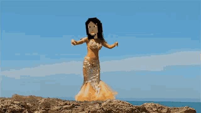 a pixel art of a woman in a mermaid outfit