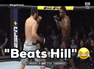 two men in a boxing ring with the words " beats hill "