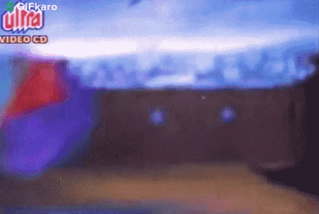a blurry picture of a video cd that says gifkaro on it