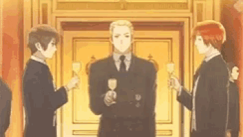 a group of men in suits and ties are standing in front of a door holding wine glasses .