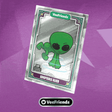 a card with a green alien on it that says adaptable alien