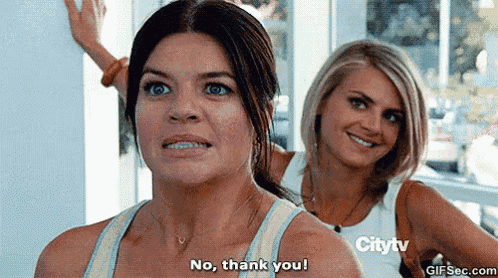 two women are standing next to each other and one of them is saying no , thank you !