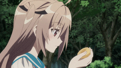 a girl in a school uniform holds a donut in her hand