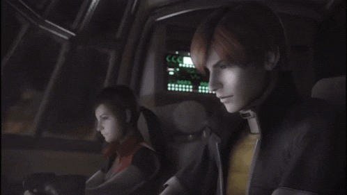 a man and a woman are sitting in front of a screen that says cc on it