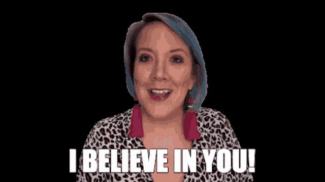 a woman with blue hair and a leopard print shirt says i believe in you .