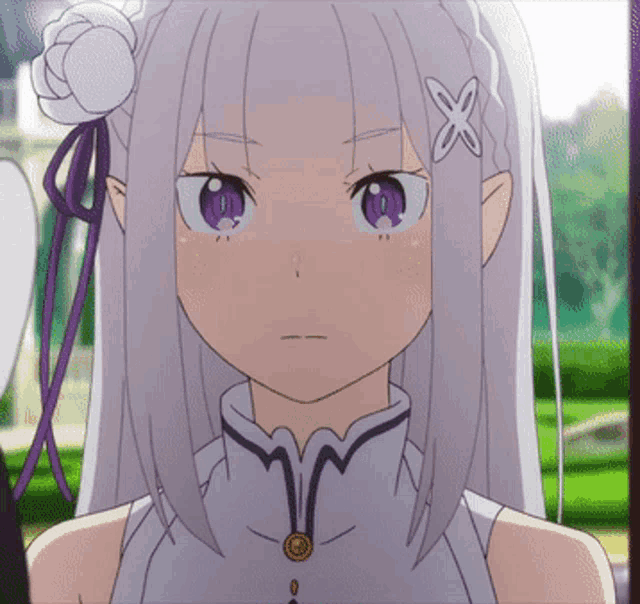 a close up of a girl with purple eyes