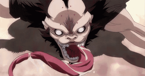 a close up of a cartoon character with a long tongue sticking out .