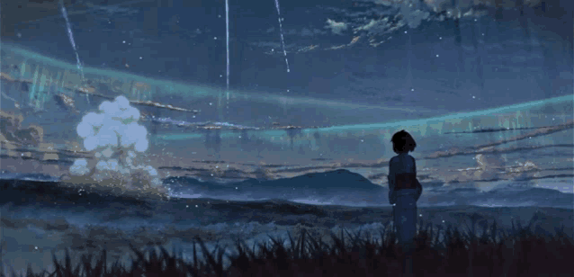 a girl in a kimono stands in a field looking up at the stars