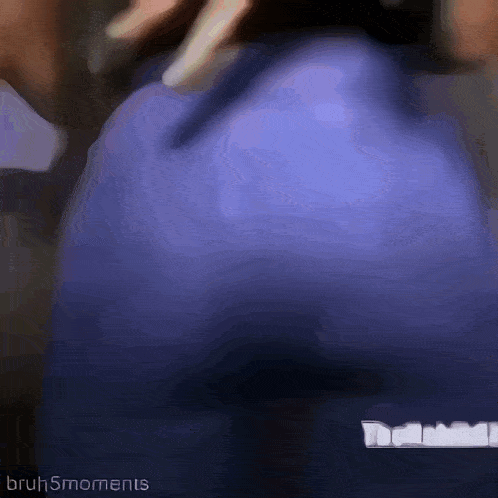 a blurry picture of a person 's butt with the words bruhsmoments on the bottom right