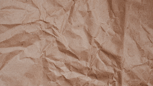 a piece of torn paper with the word " ey " written on it