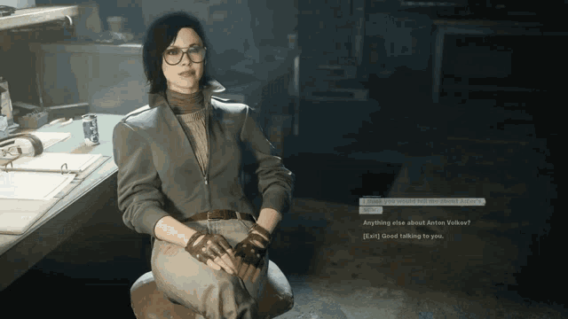 a woman in a video game is sitting on a stool and talking to someone