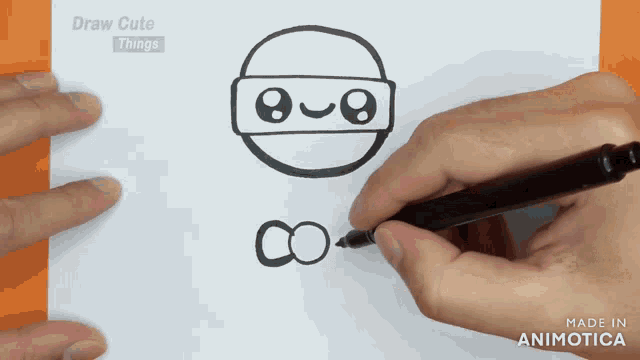 a person is drawing a ninja on a piece of paper with the words draw cute things above it