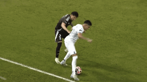 a soccer player wearing a white jersey with the number 10 on it