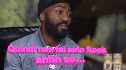 a man with a beard says quindi non fai solo rock in pink letters