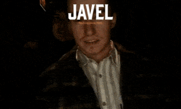 a man drinking from a glass with the name javel written on the bottom