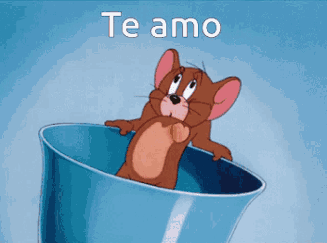 jerry from tom and jerry is sitting in a blue cup and says te amo