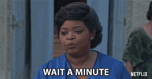 a woman in a blue shirt says wait a minute on a netflix ad