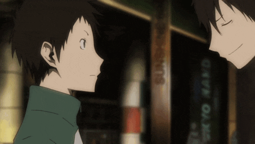 two anime characters are looking at each other in front of a sign that says tokyo rand