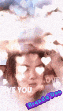 a picture of a woman with hearts in her eyes and the words love you on the bottom