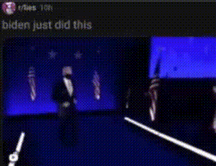 a blurry picture of a man in a tuxedo walking on a stage with the words biden just did this